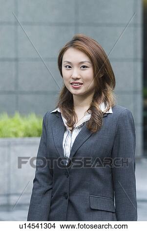 Picture - Portrait of a businesswoman smiling. Fotosearch