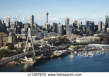 Aerial view of Anzac Bridge and downtown buildings in Sydney, Australia View Large Photo Image Stock Photo - Aerial view of Anzac Bridge and downtown buildings in Sydney, Australia. Fotosearch