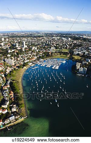 Aerial view of buildings and boats in Rushcutters Bay, Australia View Large Photo Image Stock Photo - Aerial view of buildings and boats in Rushcutters Bay, Australia. Fotosearch