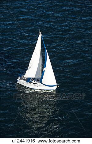 Aerial view of sailboat at sea in Sydney, Australia. View Large Photo Image Stock Photograph - Aerial view of sailboat at sea in Sydney, Australia.. Fotosearch