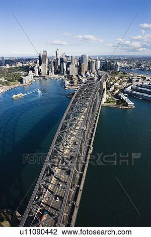Aerial view of Sydney Harbour Bridge and skyline in Sydney, Australia. View Large Photo Image Stock Image - Aerial view of Sydney Harbour Bridge and skyline in Sydney, Australia.. Fotosearch