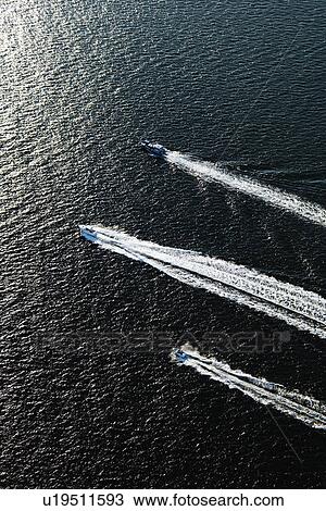 Aerial view of three boats traveling together in Sydney, Australia. View Large Photo Image Stock Image - Aerial view of three boats traveling together in Sydney, Australia.. Fotosearch