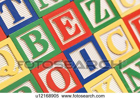 Stock Photography - Alphabet building block toys neatly arranged. Fotosearch