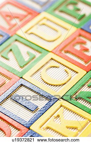 Stock Image - Alphabet toy blocks neatly arranged.. Fotosearch