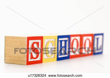 Picture - Alphabet toy building blocks spelling the word school. Fotosearch