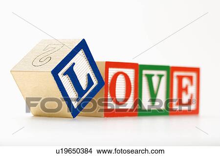 Alphabet toy building blocks spelling the word love. View Large Photo Image Picture - Alphabet toy building blocks spelling the word love.. Fotosearch