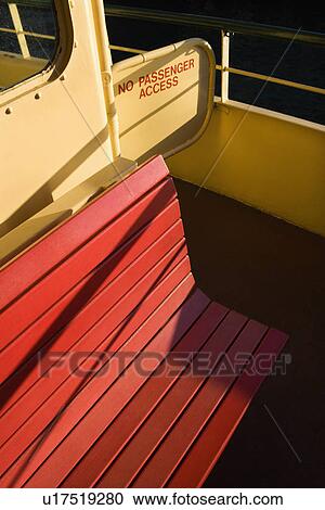 Stock Image - Bench on ferryboat with access entry in Sydney, Australia. Fotosearch