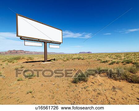 Blank billboard in middle of desert landscape with distant mountains. View Large Photo Image Stock Photograph - Blank billboard in middle of desert landscape with distant mountains.. Fotosearch