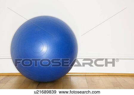 Stock Photo - Blue fitness balance ball. Fotosearch