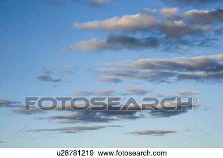 Stock Photo - Blue sky with clouds. Fotosearch