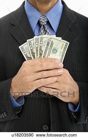 Caucasian middle aged businessman holding several twenty dollar bills. View Large Photo Image Stock Image - Caucasian middle aged businessman holding several twenty dollar bills.. Fotosearch