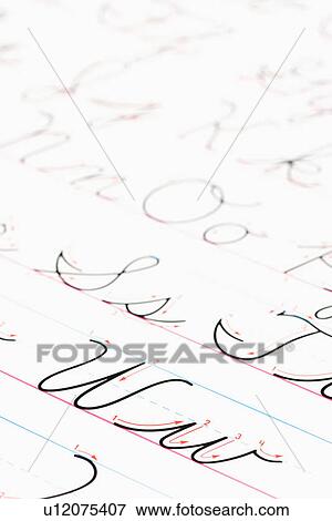 Stock Photo - Close up of cursive handwriting practice page. Fotosearch