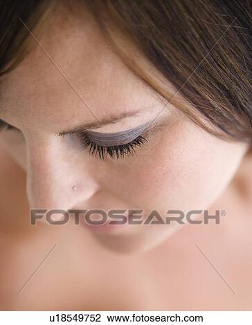 Close up of woman with eyes closed View Large Photo Image Stock Image - Close up of woman with eyes closed. Fotosearch