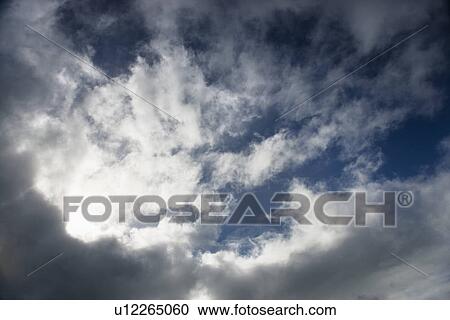 Clouds in blue sky. View Large Photo Image Stock Image - Clouds in blue sky.. Fotosearch