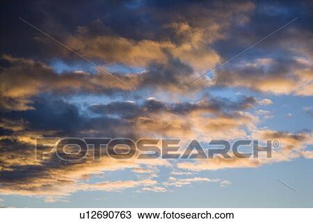 Colorful cumulus clouds in sky. View Large Photo Image Stock Image - Colorful cumulus clouds in sky.. Fotosearch