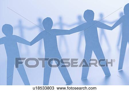 Stock Image - Cutout paper men standing holding hands.. Fotosearch