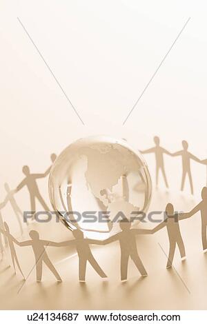 Stock Photo - Cutout paper people standing around globe holding hands. Fotosearch