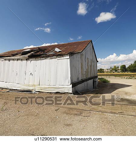 Dilapidated building with old train tracks. View Large Photo Image Stock Image - Dilapidated building with old train tracks.. Fotosearch