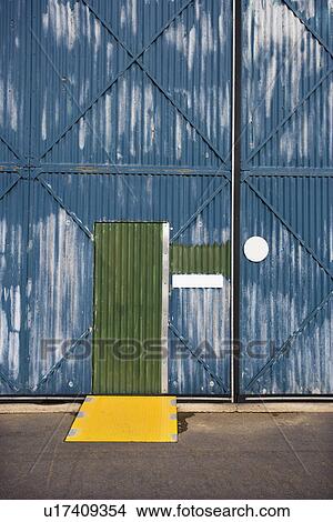 Exterior of building with door and metal siding, Australia View Large Photo Image Picture - Exterior of building with door and metal siding, Australia. Fotosearch