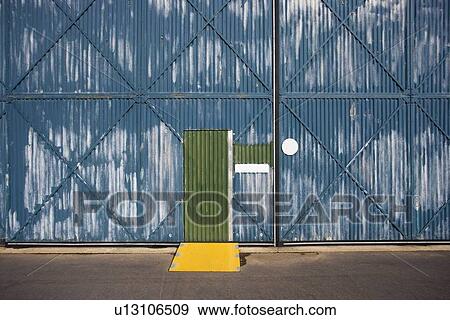 Exterior of building with door and metal siding, Australia View Large Photo Image Stock Photo - Exterior of building with door and metal siding, Australia. Fotosearch