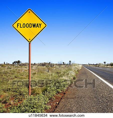 Picture - Floodway sign by road in rural Australia.. Fotosearch