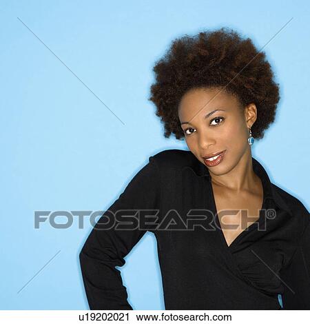Happy woman on blue background View Large Photo Image Stock Image - Happy woman on blue background. Fotosearch