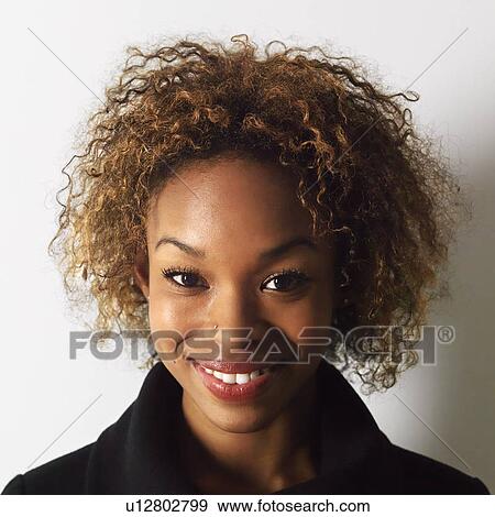 Headshot of pretty smiling young woman. View Large Photo Image Stock Photo - Headshot of pretty smiling young woman.. Fotosearch