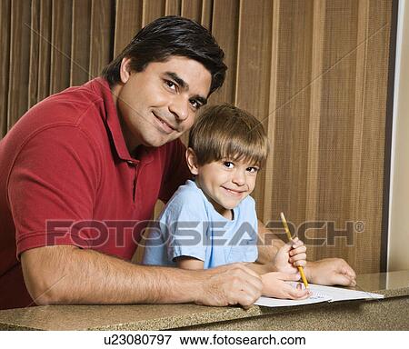 Hispanic father and son smiling at viewer with homework. View Large Photo Image Stock Photo - Hispanic father and son smiling at viewer with homework.. Fotosearch