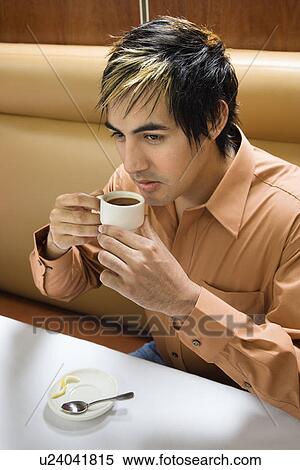 Hispanic mid adult man drinking expresso. View Large Photo Image Stock Photography - Hispanic mid adult man drinking expresso.. Fotosearch
