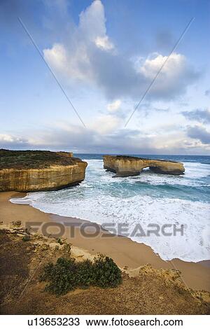 Stock Image - London Arch formation on coastline of Great Ocean Road, Australia. Fotosearch