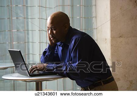 Male typing on laptop computer View Large Photo Image Stock Image - Male typing on laptop computer . Fotosearch