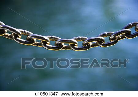 Metal chain linked View Large Photo Image Stock Photo - Metal chain linked. Fotosearch