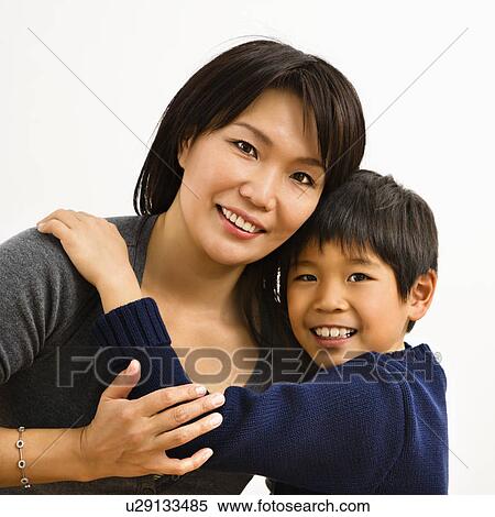 Mother and son hugging and smiling View Large Photo Image Stock Photography - Mother and son hugging and smiling. Fotosearch