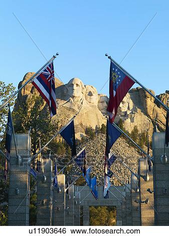 Mount Rushmore National Memorial as seen from entrance with state flags. View Large Photo Image Stock Photograph - Mount Rushmore National Memorial as seen from entrance with state flags.. Fotosearch