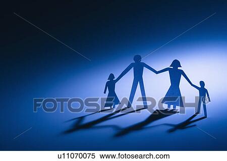 Stock Photography - Paper cutout family of four standing holding hands.. Fotosearch