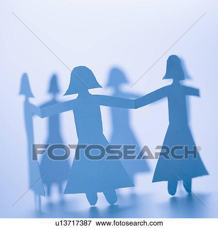 Stock Photo - Paper cutout girls holding hands standing in circle. Fotosearch