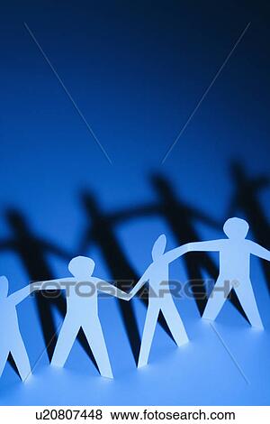 Paper cutout men standing holding hands View Large Photo Image Stock Photo - Paper cutout men standing holding hands. Fotosearch