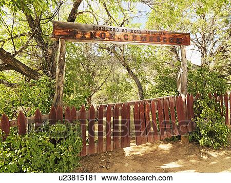 Pioneer cemetery entrance with gate and sign in woods. View Large Photo Image Stock Image - Pioneer cemetery entrance with gate and sign in woods.. Fotosearch
