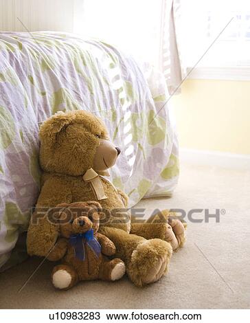 Plush brown teddy bears on bedroom floor. View Large Photo Image Stock Image - Plush brown teddy bears on bedroom floor.. Fotosearch