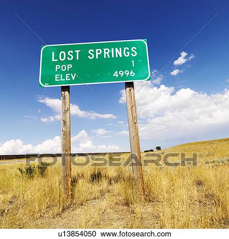 Stock Image - Population and elevation sign for Lost Springs, Wyoming. Fotosearch