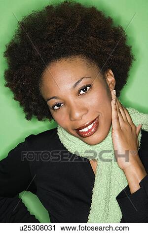 Portrait of pretty smiling woman with afro. View Large Photo Image Stock Image - Portrait of pretty smiling woman with afro.. Fotosearch
