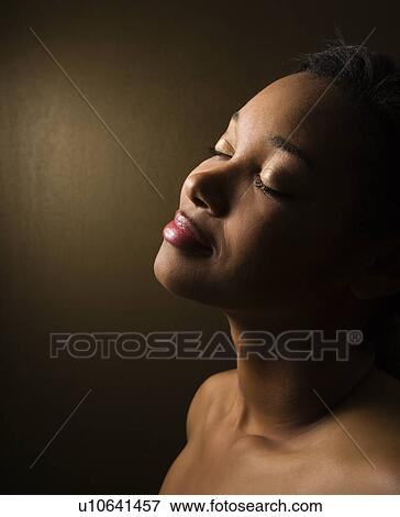 Portrait of smiling female View Large Photo Image Stock Photo - Portrait of smiling female. Fotosearch