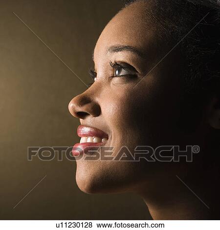 Portrait of smiling female View Large Photo Image Stock Photo - Portrait of smiling female. Fotosearch