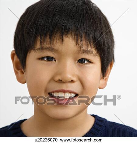 Portrait of young Asian boy smiling. View Large Photo Image Stock Image - Portrait of young Asian boy smiling.. Fotosearch