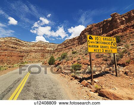 Road sign warning steep grade through rocky Utah landscape. View Large Photo Image Stock Photo - Road sign warning steep grade through rocky Utah landscape.. Fotosearch