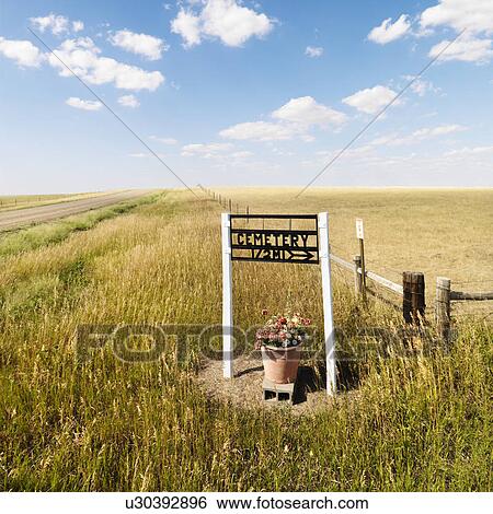 Roadside sign indicating directions to rural cemetery. View Large Photo Image Stock Photograph - Roadside sign indicating directions to rural cemetery.. Fotosearch