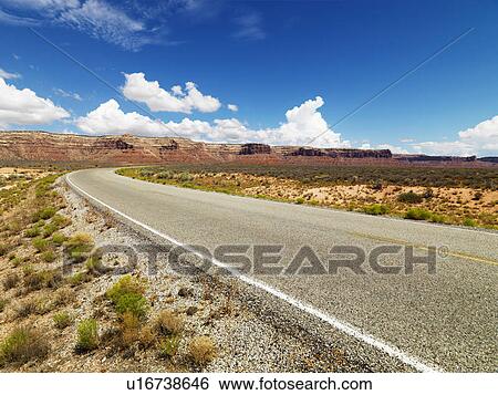 Rural Utah scenic road with mountain range in distance. View Large Photo Image Stock Photograph - Rural Utah scenic road with mountain range in distance.. Fotosearch