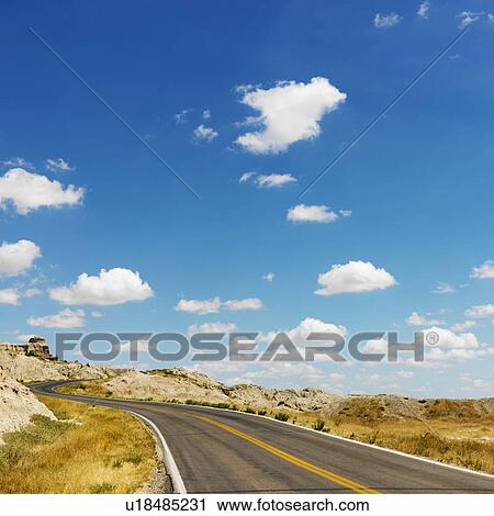 Scenic roadway in Badlands National Park, North Dakota. View Large Photo Image Stock Image - Scenic roadway in Badlands National Park, North Dakota.. Fotosearch