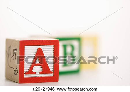 Stock Photograph - Selective focus of alphabet blocks.. Fotosearch