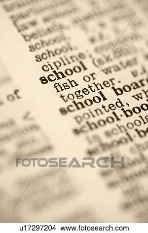 Picture - Selective focus of dictionary entry for the word school.. Fotosearch